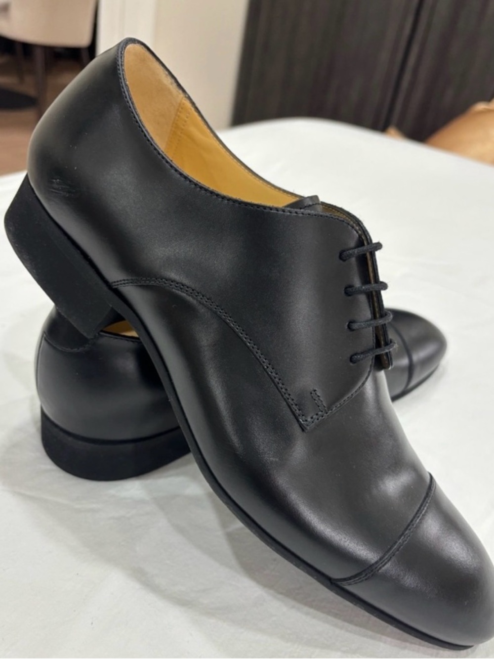 CHANEL. Men's Black Leather Cap-Toe Dress Shoes